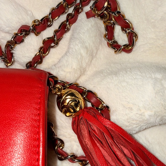CHANEL Handbags - CHANEL Red Quilted Lambskin Crossbody with Gold Chain and Tassel